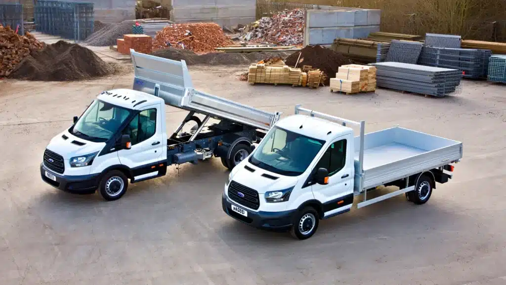 Tipper truck and flatbed parked on a Medway construction site during an end-of-year clear-out, used to promote Hire2You’s tipper and flatbed hire services.